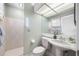 Well lit bathroom featuring tile and a large mirror at 6024 Kipps Colony E Dr, Gulfport, FL 33707