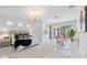 Spacious main bedroom boasts sitting area, chandelier, and bright windows with great natural light at 6024 Kipps Colony E Dr, Gulfport, FL 33707