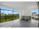 Large covered patio with black railing and great neighborhood views at 6024 Kipps Colony E Dr, Gulfport, FL 33707