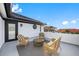 Rooftop deck with stylish wicker furniture with scenic views at 6024 Kipps Colony E Dr, Gulfport, FL 33707