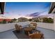 Relaxing rooftop patio with comfortable wicker furniture and panoramic views of the waterfront community at 6024 Kipps Colony E Dr, Gulfport, FL 33707