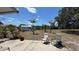 Spacious backyard featuring mature landscaping, patio and lots of open space at 6405 Klaus Ct, Port Charlotte, FL 33981