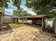 This backyard features a spacious covered patio, perfect for outdoor dining and entertaining at 6423 Boxwood St, Brooksville, FL 34602