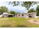 The expansive backyard offers plenty of space for outdoor activities and gardening opportunities at 6423 Boxwood St, Brooksville, FL 34602