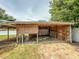 The garage features sturdy overhead covering, ample space, and offers protection for parking and projects at 6423 Boxwood St, Brooksville, FL 34602