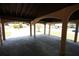 Large carport with stone columns providing shade and protection for your vehicles at 6514 La Mesa Cir, Tampa, FL 33634