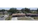 Single-story home with a covered entrance and driveway in a neighborhood setting, offering a cozy suburban feel at 6514 La Mesa Cir, Tampa, FL 33634