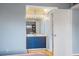 Stylish bathroom vanity features a well-lit mirror and ample storage space at 775 N Village N Dr # 106, St Petersburg, FL 33716