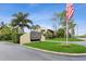 Welcome to Village Lake Condominiums, featuring beautiful landscaping and a well-maintained entrance at 775 N Village N Dr # 106, St Petersburg, FL 33716