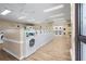 Clean laundry room featuring multiple washers and dryers for residents' convenience at 775 N Village N Dr # 106, St Petersburg, FL 33716