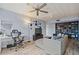 Cozy living room featuring modern decor, a dedicated workspace, and plenty of space for relaxation and entertainment at 775 N Village N Dr # 106, St Petersburg, FL 33716