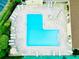 Aerial view of the beautiful community swimming pool with plenty of room for relaxation at 775 N Village N Dr # 106, St Petersburg, FL 33716