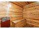 Community sauna room with wooden benches and a heater, offering a relaxing amenity at 775 N Village N Dr # 106, St Petersburg, FL 33716