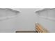 Spacious walk-in closet with shelving and hanging rods for ample storage at 776 116Th N Ave # 1110, St Petersburg, FL 33716
