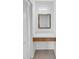Vanity with mirror, drawer, and cabinet for additional storage at 776 116Th N Ave # 1110, St Petersburg, FL 33716
