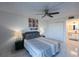 Bright bedroom with modern decor and an ensuite bathroom at 800 Cove Cay Dr # 4F, Clearwater, FL 33760