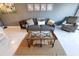 Inviting living room featuring stylish furnishings and a decorative area rug at 800 Cove Cay Dr # 4F, Clearwater, FL 33760