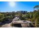 Plenty of covered parking spaces with lush greenery around the building at 800 Cove Cay Dr # 4F, Clearwater, FL 33760