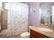Bathroom featuring a bathtub with shower and granite countertop and sink at 8511 White Poplar Dr, Riverview, FL 33578