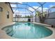 A serene screened-in pool offers relaxation and recreation in a private outdoor space at 8511 White Poplar Dr, Riverview, FL 33578