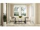 Bright dining room with a black dining table and white chairs under a pair of large windows at 9565 Runaway Breeze Dr, Land O Lakes, FL 34637