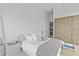Bright bedroom with stylish furnishings and ample closet space at 1020 Sunset Point Rd # 712, Clearwater, FL 33755