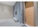 Inviting hallway with textured wall, stylish bench seating, and a contemporary design aesthetic at 1020 Sunset Point Rd # 712, Clearwater, FL 33755