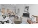 Open-concept living space featuring modern decor, dining area, and a stylish sideboard at 1020 Sunset Point Rd # 712, Clearwater, FL 33755