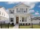 Charming two-story home featuring a classic design, complemented by well-manicured landscaping at 1201 35Th N Ave, St Petersburg, FL 33704