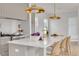 Modern kitchen with an island, stainless steel appliances, and bar stool seating at 1201 35Th N Ave, St Petersburg, FL 33704