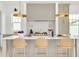 Spacious kitchen with a large island, pendant lights, and seating for three at 1201 35Th N Ave, St Petersburg, FL 33704