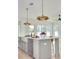 Bright kitchen featuring a large island, pendant lighting, and modern appliances at 1201 35Th N Ave, St Petersburg, FL 33704