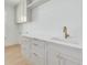 Functional laundry room with ample counter space and built-in cabinets at 1201 35Th N Ave, St Petersburg, FL 33704