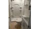 Bathroom with shower and toilet and a small vanity at 12055 4Th E St, Treasure Island, FL 33706