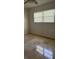Cozy bedroom with a ceiling fan, neutral paint, and natural light at 12055 4Th E St, Treasure Island, FL 33706