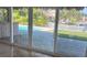 Sliding glass doors lead to the backyard and pool from this updated home at 12055 4Th E St, Treasure Island, FL 33706