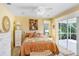 Bedroom with yellow walls and plush bed at 1212 Baycove Ln, Lutz, FL 33549