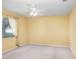 Bright bedroom with neutral carpet and a window offering lots of light at 1212 Baycove Ln, Lutz, FL 33549