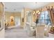 The dining area has carpet and a view of the front door at 1212 Baycove Ln, Lutz, FL 33549