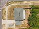 Aerial view of home displaying roof, yard, and surrounding neighborhood at 12470 Elgin Blvd, Spring Hill, FL 34609