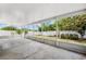 Large screened lanai with a view of the backyard landscaping at 12470 Elgin Blvd, Spring Hill, FL 34609