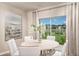 Dining room with a view of the backyard through sliding glass doors and a view of the backyard at 12842 Canter Call Rd, Lithia, FL 33547