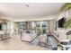 Open-concept living room with bright dining area and lots of natural light at 12842 Canter Call Rd, Lithia, FL 33547