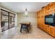Dining room features direct access to screened in pool area, wood cabinets and an electric oven at 14169 Fennsbury Dr, Tampa, FL 33624
