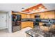 Bright kitchen features stainless steel appliances, granite countertops, and ample cabinet space at 14169 Fennsbury Dr, Tampa, FL 33624