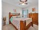 Cozy bedroom with wood furniture, a comfortable bed, and soft carpeting at 14643 Brumby Ridge Ave, Lithia, FL 33547
