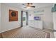 Bedroom with a dart board and patterned carpet and a window at 14643 Brumby Ridge Ave, Lithia, FL 33547