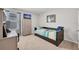 Bright bedroom with desk, television and daybed at 14643 Brumby Ridge Ave, Lithia, FL 33547
