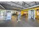A fully-equipped gym offers a variety of machines and free weights for a diverse workout experience at 1516 E Lake Woodlands Pkwy, Oldsmar, FL 34677