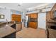 Bright kitchen with stainless steel appliances, wooden cabinets and lots of counter space for easy meal preparation at 1516 E Lake Woodlands Pkwy, Oldsmar, FL 34677